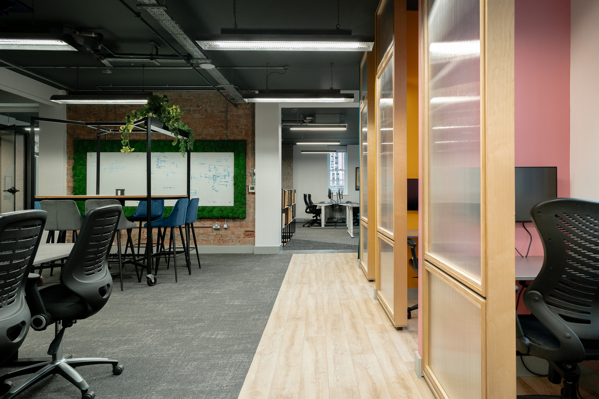 Hippo Digital office area with lighting upgrade using suspended LED lighting
